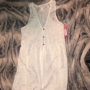 *Cream Colored Sleeveless Cardigan*